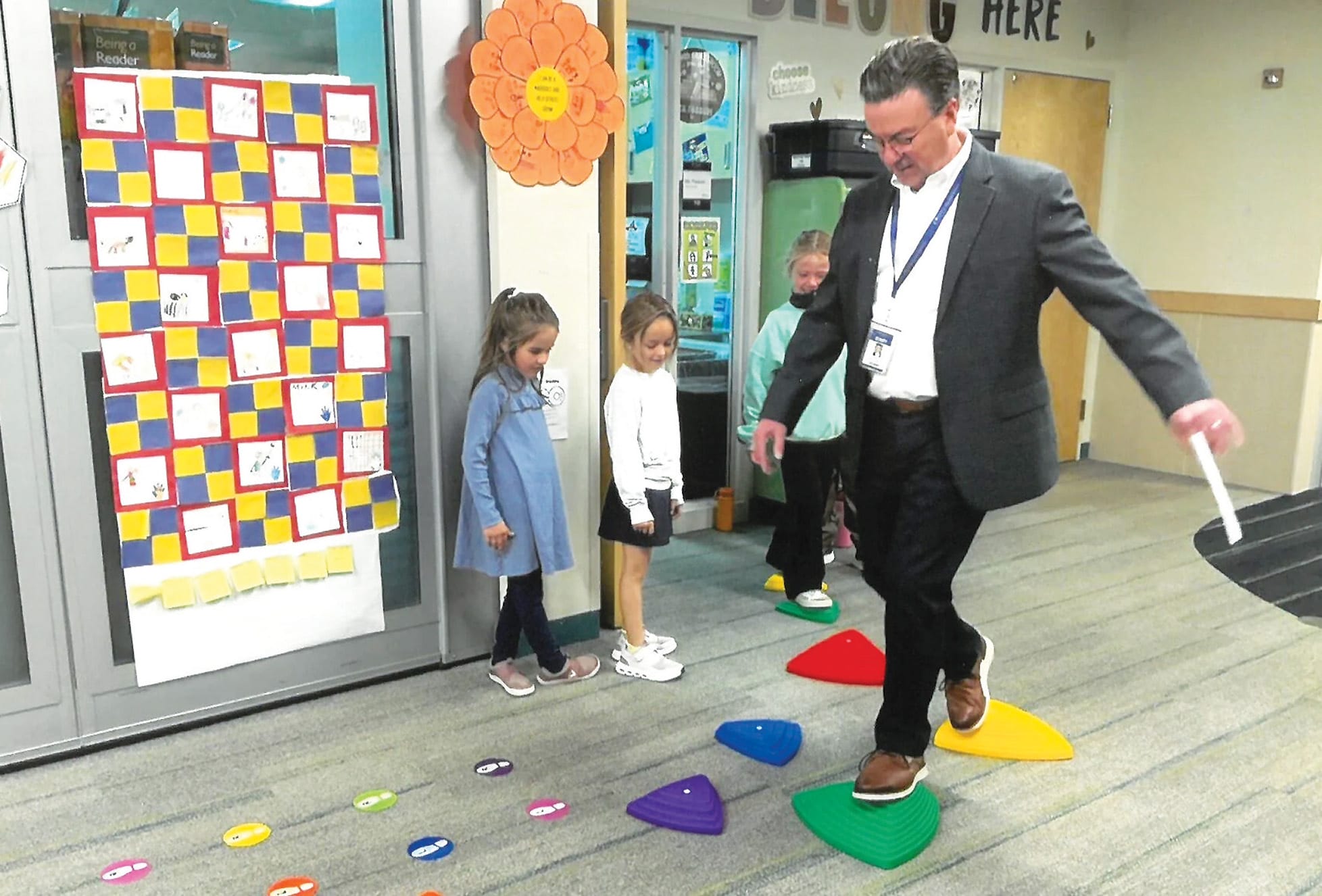 Former Wayzata Superintendent Chace Anderson plays games with Wayzata students.